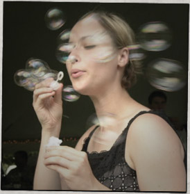 [photo: Rachael blowing bubbles]